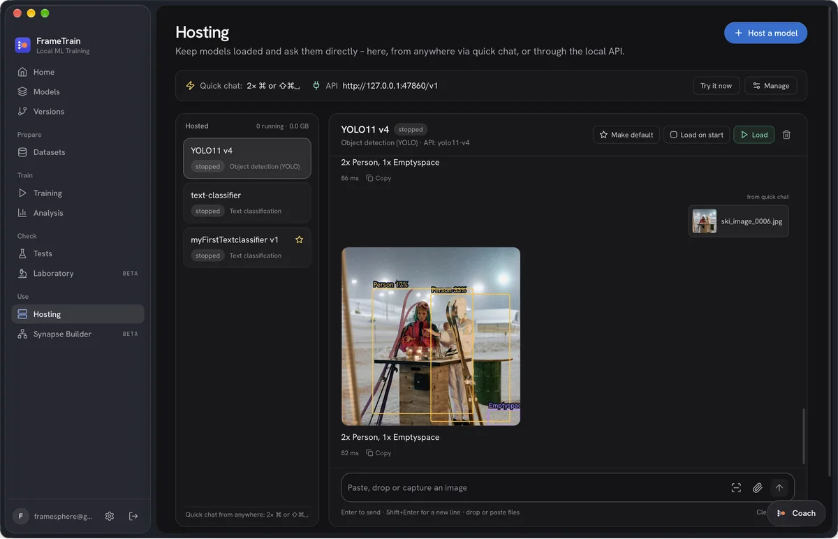 FrameTrain Hosting: a YOLO11 model detects two people in a photo